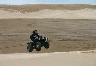 ATV on sand dunes, Geselle, Argentina
